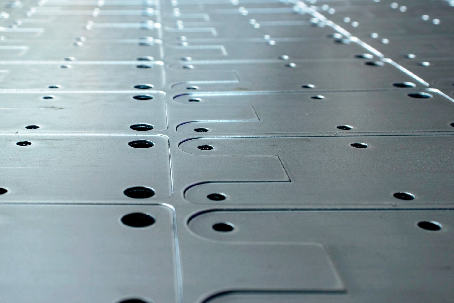 Freshly laser-cut steel parts